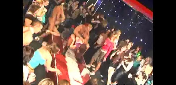  Babes at a huge party give blowjobs on stage